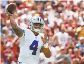  ?? Alex Brandon / Associated Press ?? Dallas rookie quarterbac­k Dak Prescott has some wondering if he might be better than Tony Romo.