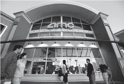  ?? FREDERIC J. BROWN / AFP/GETTY IM CNG ?? AMC has been reopening its theaters since August with seating capacity restricted to between 20 percent and 40 percent.
