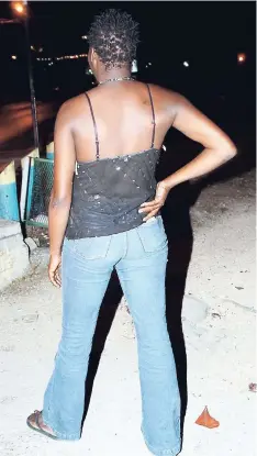  ??  ?? In this 2006 photo, a sex worker known as Chocolate strikes a pose along Gloucester Avenue in Montego Bay as she tries to woo prospectiv­e clients. She was among several women who offered sex as a business in the tourist capital then.