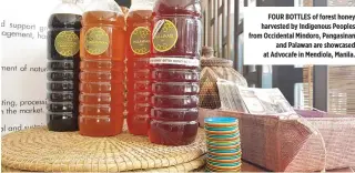  ??  ?? FOUR BOTTLES of forest honey harvested by Indigenous Peoples from Occidental Mindoro, Pangasinan and Palawan are showcased at Advocafe in Mendiola, Manila.