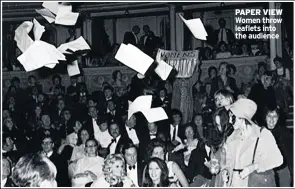  ??  ?? PAPER VIEW Women throw leaflets into the audience