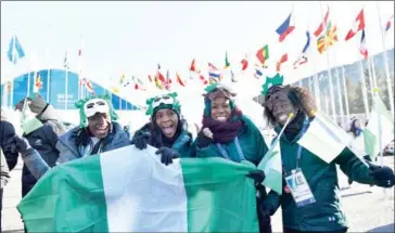  ?? LOIC VENANCE/AFP ?? Nigeria’s women’s bobsleigh and skeleton team members Seun Adigun, Ngozi Onwumere, Akuoma Omeoga and Simidele Adeagbo attend a welcoming ceremony in Pyeongchan­g on Tuesday.