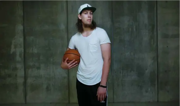  ?? COLE BURSTON FOR THE TORONTO STAR ?? Canadian NBA player Kelly Olynyk just signed a 4-year deal with the Miami Heat, worth an estimated $50 million (U.S.). But the Toronto-born star hasn’t let that change his frugal ways.