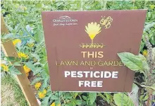  ??  ?? Nirmala Chinnappar­eddy, from Charlottet­own, P.E.I., practises sustainabl­e gardening, never using any pesticides or sprays in her garden. After attending a Garden Day workshop for the city, she received a sign and has been using it ever since.