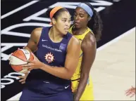  ?? Mike Carlson / Associated Press ?? The Connecticu­t Sun’s Brionna Jones, left, is defended by the Chicago Sky’s Cheyenne Parker during a WNBA game last season.