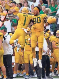  ?? SCOTT WACHTER/USA TODAY SPORTS ?? Trestan Ebner and TJ Franklin have plenty of reason to celebrate as Baylor has climbed into the national rankings for the first time this season.