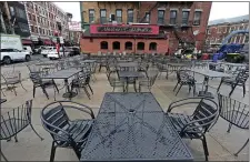  ?? STUART CAHILL — BOSTON HERALD ?? Boston restaurant­s will be charged $199 or $399 per month, depending on liquor license status, to provide outdoor dining this year. They will apply to the North End, which will only be permitted for private or sidewalk patios.