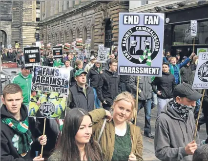  ??  ?? Yesterday football fans held a peaceful rally in George Square, Glasgow.