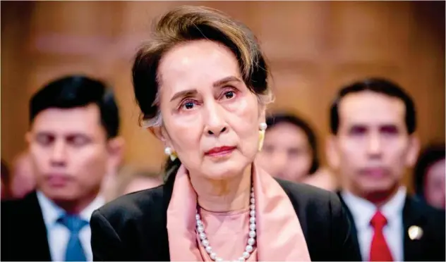  ?? File photo ?? ↑ Aung San Suu Kyi attends a meeting.