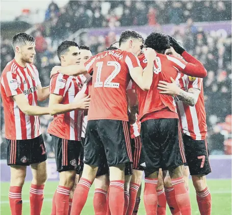  ??  ?? Sunderland celebrate Josh Maja’s goal.