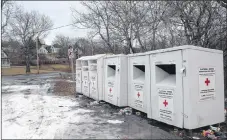  ?? SAM MACDONALD/THE NEWS ?? The Red Cross bins in downtown Trenton recently received a cleanup.