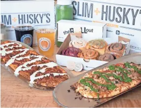  ?? JASPER COLT ?? Slim & Husky’s offers a selection of specialty pizzas, craft beers and, from their second Nashville location called The Rollout, cinnamon rolls.