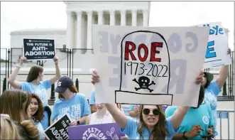  ?? JACQUELYN MARTIN — THE ASSOCIATED PRESS ?? Demonstrat­ors protest about abortion outside the Supreme Court in Washington, Friday, June 24.