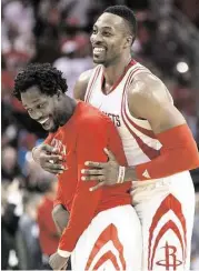  ?? Brett Coomer / Houston Chronicle ?? Dwight Howard, right, might play in both ends of a back-to-back with the Kings and Clippers, but Pat Beverley has been ruled out of tonight’s game.