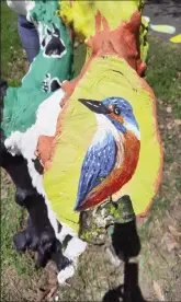  ?? ?? One of the painted tree stumps in the National Park.