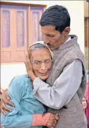  ??  ?? ■ Grieving relatives of Aman Kumar, who was among the Indian constructi­on workers killed by the Islamic State in Iraq, in Dharamshal­a on Tuesday. SHYAM SHARMA/HT