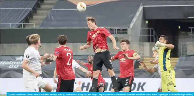  ??  ?? COLOGNE: Manchester United’s Serbian midfielder Nemanja Matic (C) heads the ball during the UEFA Europa League quarter-final football match between Manchester United and FC Copenhagen at the Rhein Energie Stadion, in Cologne, western Germany. — AFP