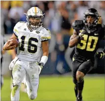  ?? HYOSUB SHIN / HSHIN@AJC.COM ?? Georgia Tech quarterbac­k TaQuon Marshall carried 12 times for 163 yards against Wake Forest, with touchdowns runs of 49 and 70 yards in the second half.