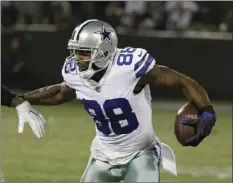  ?? AP PHOTO/ERIC RISBERG ?? In this Dec. 17 file photo, Dallas Cowboys wide receiver Dez Bryant runs against the Oakland Raiders during the second half of an NFL football game in Oakland.
