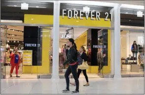  ?? (AP/Mark Lennihan) ?? Forever 21 is part of a growing list of retailers that have struggled because of changing shopping behaviors and preference­s among teenagers who have turned away from malls.