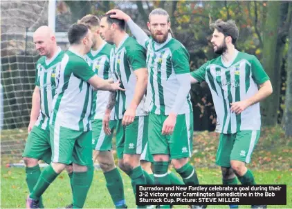  ??  ?? Burradon and New Fordley celebrate a goal during their 3-2 victory over Cramlingto­n Benedictin­e in the Bob Sturrock Cup. Picture: STEVE MILLER