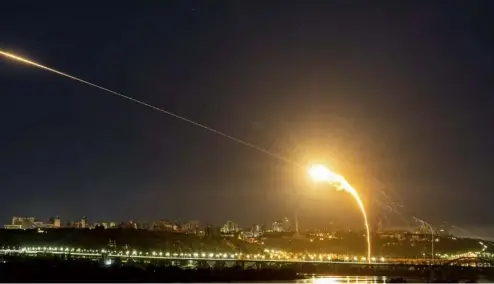  ?? ?? FILE - Ukrainian air defense intercepts a Shahed drone mid-air in the third Russia aerial attack on the capital in the last 24 hours in Kyiv, Ukraine, on May 30, 2023.