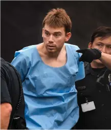  ?? Tennessean via AP) (Photo by Lacy Atkins, The ?? In this Monday, April 23, 2018 photo, Travis Reinking, suspected of killing four people in a late-night shooting at a Waffle House restaurant, is escorted into the Hill Detention Center in Nashville, Tenn., Monday, April 23, 2018.