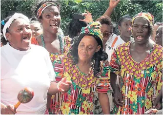  ?? PHOTOS BY PAUL H. WILLIAMS ?? Spirited singing is a major part of the rituals at Maroon celebratio­ns such as the ones at Accompong Town, St Elizabeth.