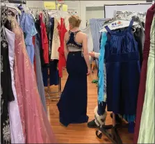  ?? COURTESY OF BOYERTOWN JUNIOR WOMAN’S CLUB ?? Boyertown Junior Woman’s Club welcomed junior and senior high girls from the area to browse a collection of 700prom dresses. The annual free prom dress event helps girls have a memorable prom experience.