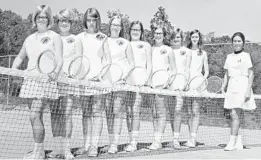  ??  ?? Carol Talbott (now Deyle) stands with her 1970 tennis team at Hayes Junior High School in St. Albans, West Virginia. Terri Miller (now Winefordne­r) is at right.