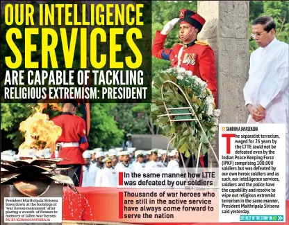  ?? PIC BY KUSHAN PATHIRAJA ?? President Maithripal­a Sirisena bows down at the footsteps of ‘war heroes monument’ after placing a wreath of flowers in memory of fallen war heroes: