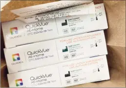  ?? Meghan Friedmann / Hearst Connecticu­t Media ?? QuickVue COVID-19 tests purchased Wednesday at CVS on Whalley Avenue in New Haven.