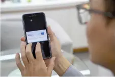  ?? ?? Course participan­t Qiu Zhouwen showing a TikTok shop webpage at a cosmetics company in Guangzhou, in southern China’s Guangdong province.