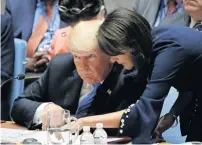  ?? —Reuters ?? US President Donald Trump and US Ambassador to the UN Nikki Haley confer during a meeting of the United Nations Security Council at UN headquarte­rs in New York on Wednesday.