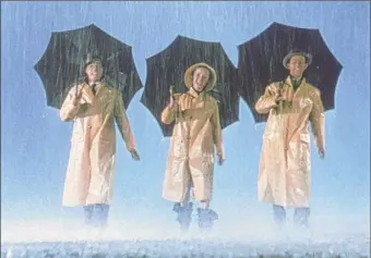  ?? Provided photo ?? Gene Kelly, from left, Debbie Reynolds and Donald O’connor in the 1952 musical “Singing in the Rain” airing at 8 p.m. Saturday on TCM.