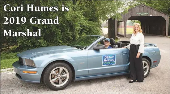  ?? PHOTO PROVIDED ?? 2019 Marshall County Blueberry Festival Grand Marshal Cori Humes stands beside Bob Whitmer’s mustang in honor of the late Dick Johnson.