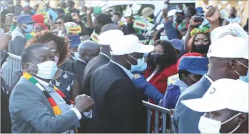  ?? ?? President Mnangagwa greets supporters on arrival at the Joshua Mqabuko Nkomo Internatio­nal Airport in Bulawayo yesterday ahead of the official
opening of the ICC Men’s T20 World Cup
qualifier