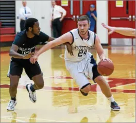  ?? DENNIS KRUMANOCKE­R - FOR DIGITAL FIRST MEDIA ?? Kutztown’s Brayden Eck drives against Lancaster Mennonite during the District 3-3A semifinals last week.