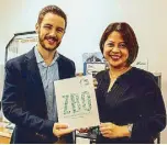  ??  ?? Cemex energy director Eduardo Pons and corporate communicat­ions manager Erlinda Lizardo hold the book ZBO for Business Best Practices: Volume II.