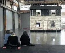  ?? STEVEN SENNE — ASSOCIATED PRESS FILE PHOTO ?? In this April 1, 2018 file photo, visitors view the rebuilt house of Rosa Parks at the WaterFire Arts Center in Providence, R.I. The house where Parks sought refuge in Detroit after fleeing the South will be auctioned on Thursday, July 26 in New York,...