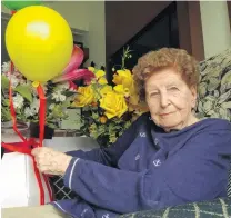  ?? PHOTO: GUY WILLIAMS ?? Birthday girl . . . Luce Wilsens enjoys her flowers from Kamana Lakehouse staff.