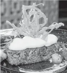  ?? Dave Rossman / Contributo­r ?? Dory Fung lightens 24 Karrot Cake with pineapple and crowns it with candied carrot curls.