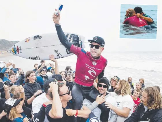  ?? Pictures: WSL ?? Mick Fanning is chaired up the beach by Taylor Knox and Joel Parkinson and (inset) the surfing great embraces his Bells final conqueror Italo Ferreira.