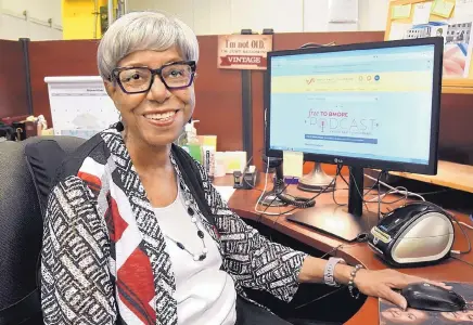  ?? AMY DAVIS/BALTIMORE SUN ?? Sadye Whitt, who has worked for the city longer than any other employee, has been with the Enoch Pratt Free Library for 56 years. She is 77, and has no intention of quitting a job she still enjoys and does well.