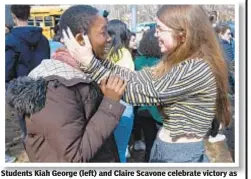  ??  ?? Students Kiah George (left) and Claire Scavone celebrate victory as leaders of Ethical Culture Fieldston School in the Bronx agreed to address racial issues. Below, students show strength in unity.