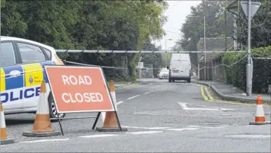  ?? FM4043923 ?? The Rose Inn and Ulley Road were taped off after the incident