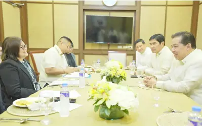  ?? PHOTOGRAPH COURTESY OF HOUSE SPEAKER ROMUALDEZ OFFICE ?? TRADE Undersecre­tary Carol Sanchez (left, in black) meets House Speaker Martin Romualdez (far right), among other House lawmakers to discuss the additional P500 per month discounts on groceries and other prime commoditie­s to senior citizens.