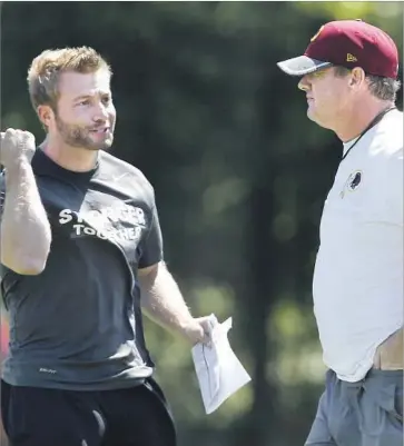  ?? Alex Brandon Associated Press ?? SEAN McVAY, left, and Jay Gruden were “Stronger Together” last year on the Washington Redskins coaching staff, but McVay looked just fine on his own last week in his debut as head coach of the Rams.