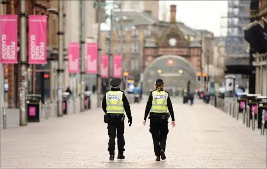  ?? Picture: Jamie Simpson ?? Police patrol Glasgow city centre during the first coronaviru­s lockdown