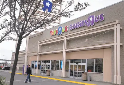  ?? Paul Chinn / The Chronicle ?? The combined Toys R Us and Babies R Us store in Emeryville is among the more than 180 stores that the company plans to close across the country starting in February. The retailer that once dominated the toy market has been hit hard over the years by...